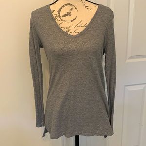 Light gray long sleeve t shirt with slight gold shimmer
